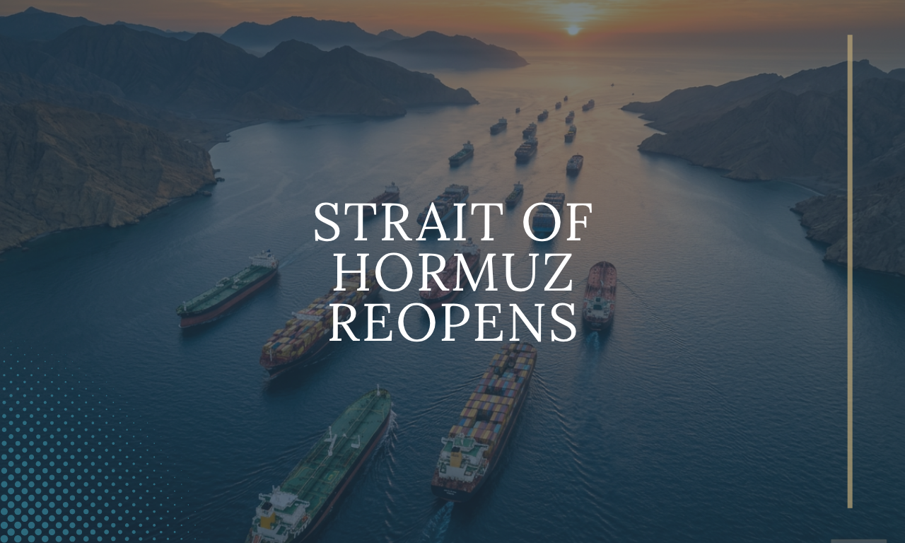 Strait of Hormuz reopening with cargo ships and oil tankers moving through a major global shipping route at sunrise